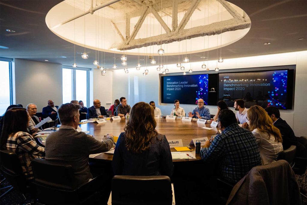 Roundtable participants discussing KPMG and InnoLead Benchmarking Report findings