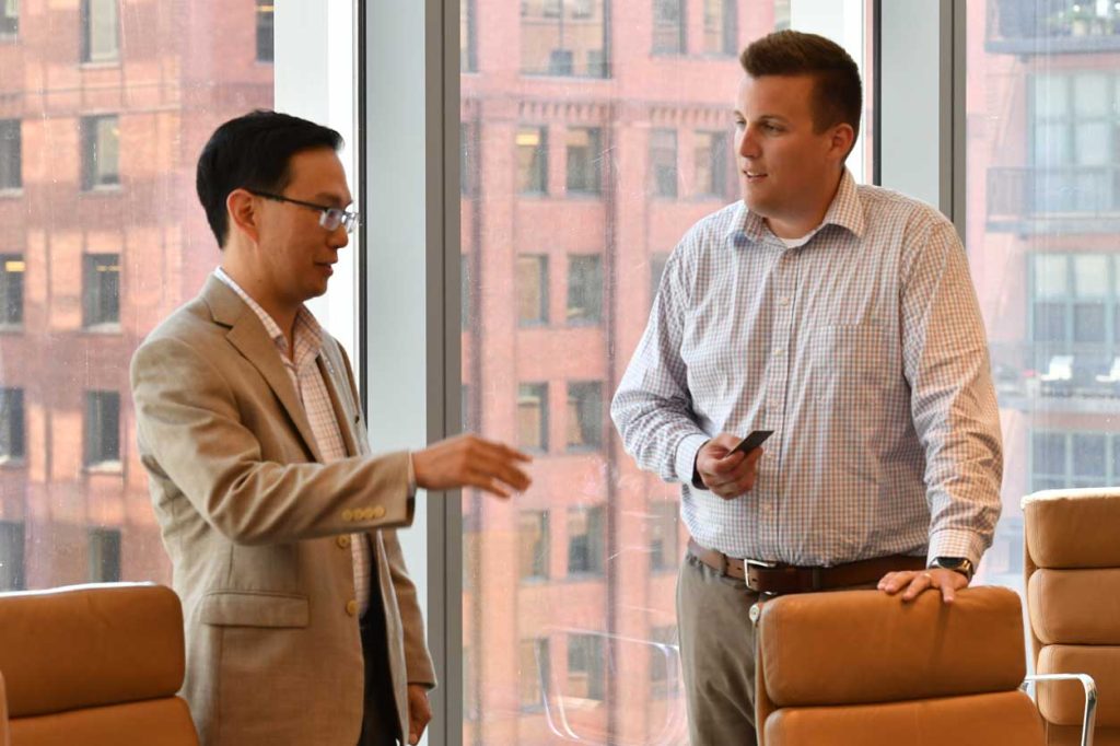Felix Lu, Director of Corporate Engagement at University of Chicago; and Ryan Knox, Marketing Director at Flex Fab.