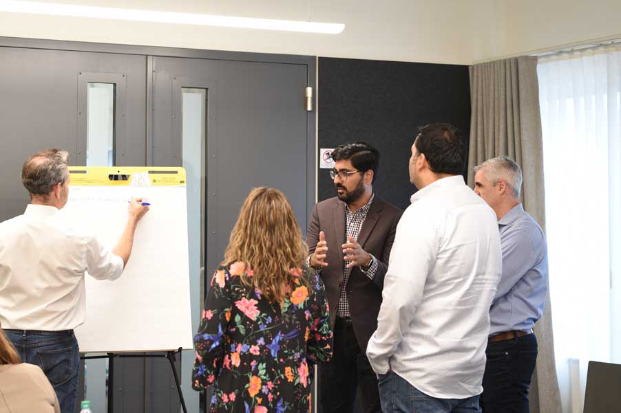 Alex Slawsby takes notes during one of the breakout discussions.