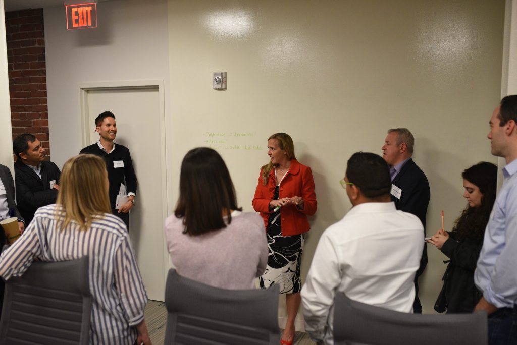 Amelia Dunlop of Deloitte leads one of the breakout groups.