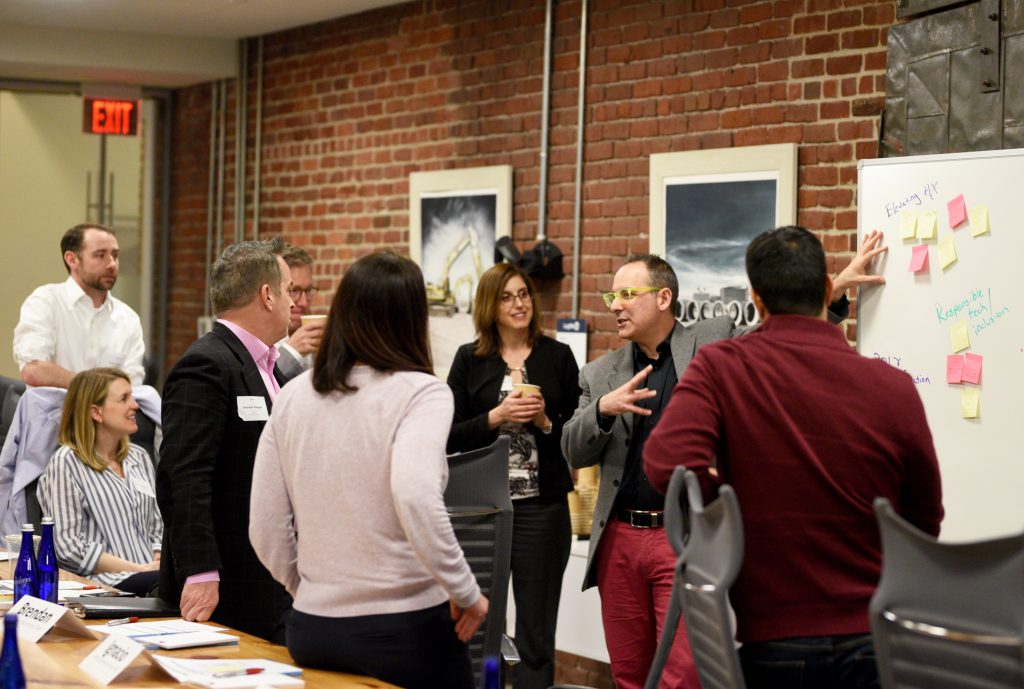 Participants formed breakout groups to dive deeper into topics.