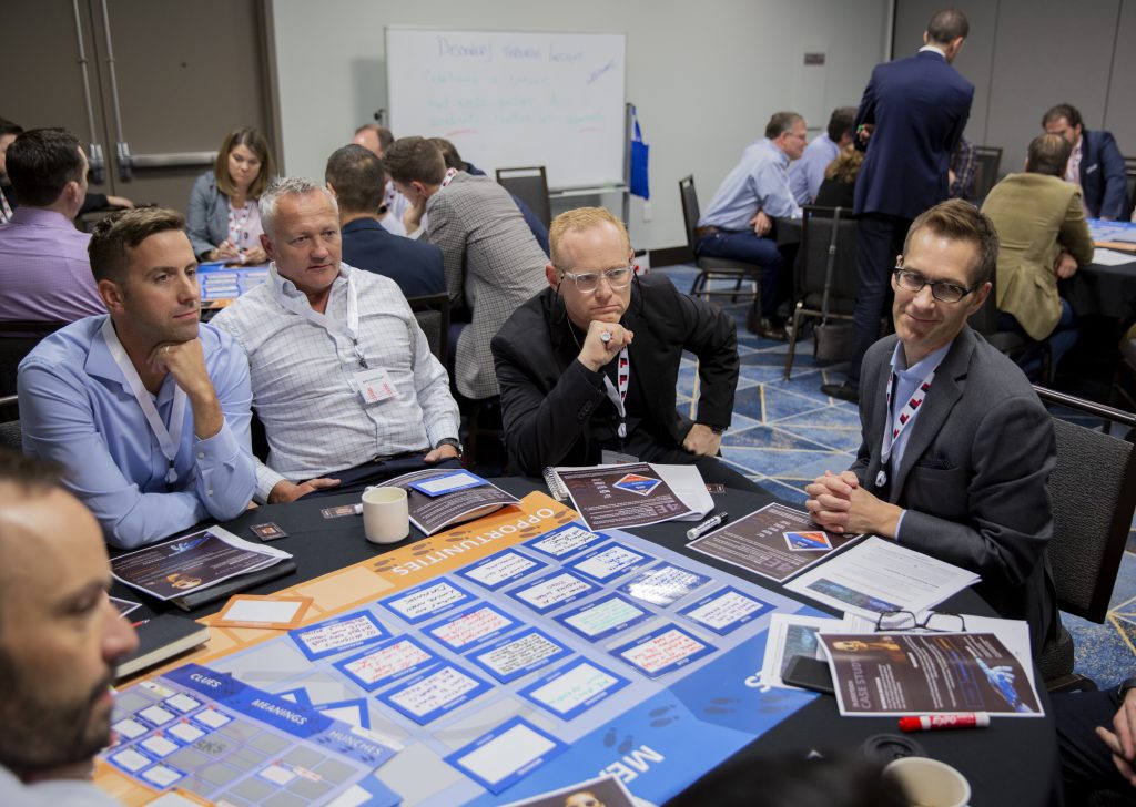 Attendees participate in an interactive skill-building workshop led by Planbox.