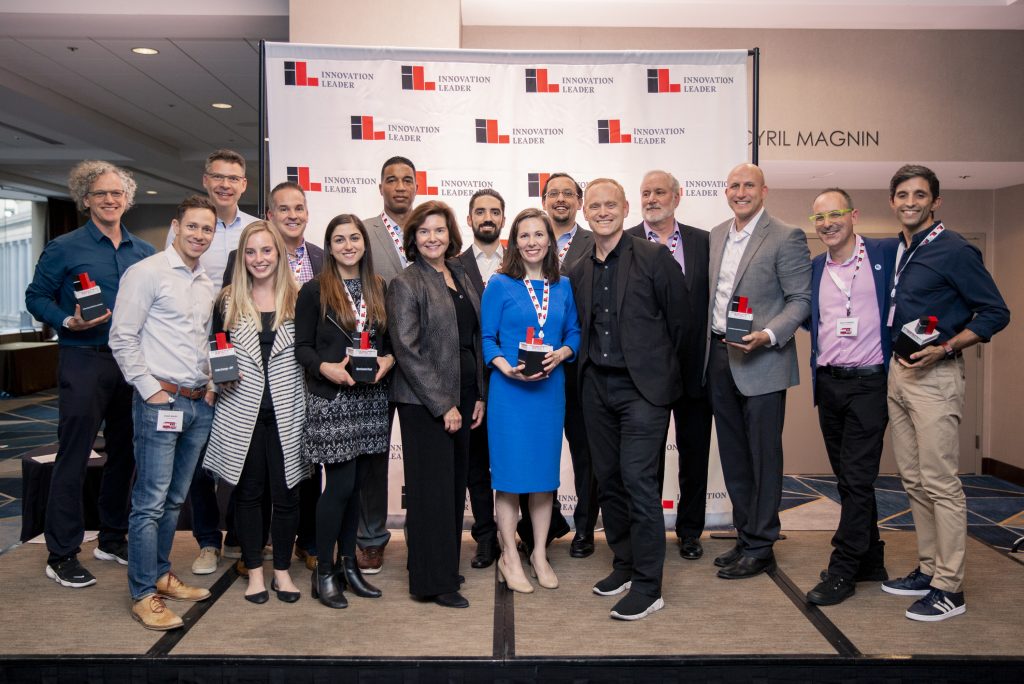 Some of the Impact 2019 award winners pose for a photo.