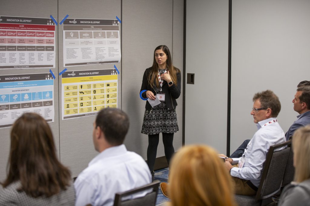 Lisa Bonacci, Director of Innovation at Merchants Fleet, co-leads a session with CEO Brendan Keegan.