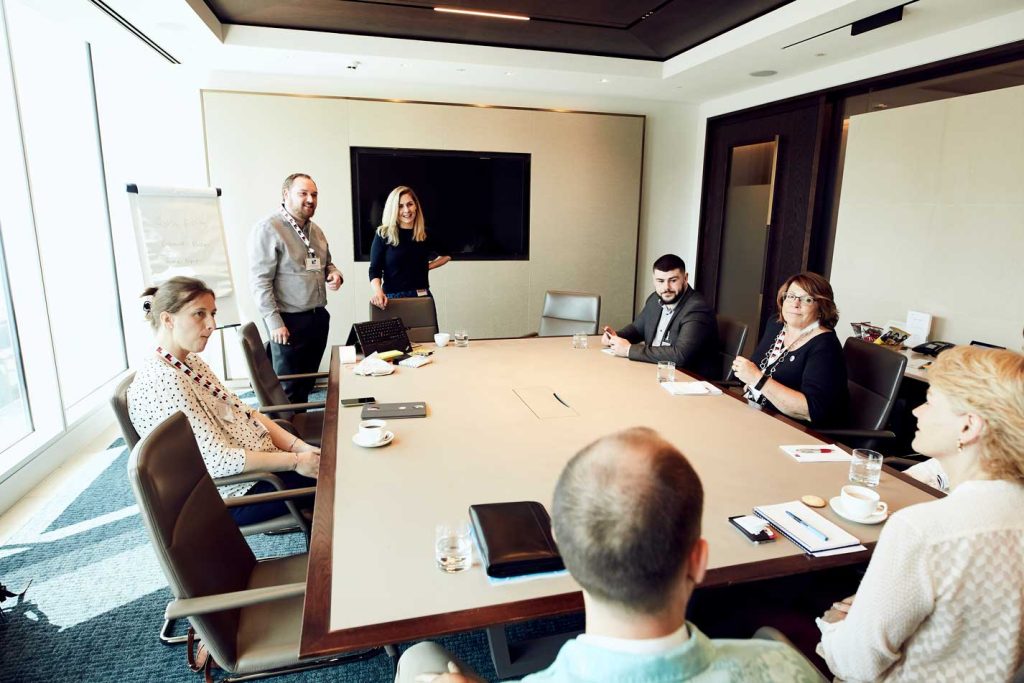 Robin Gissing and Catherine Philips of Heathrow Airport lead a whiteboard session.