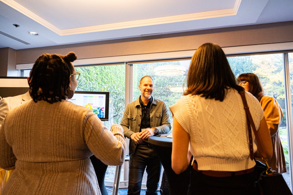 Trevor Anulewicz of Launch by NTT Data connects with participants.