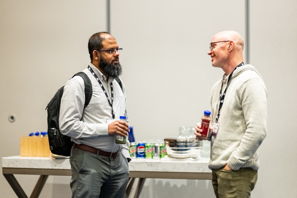 Tabish Maqbool of ExxonMobil with Scott Burns of NRG