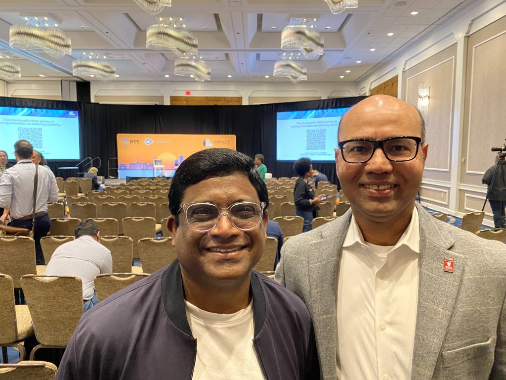 Prat Vemana of Target and Shamim Mohammed of CarMax get ready to speak on the mainstage