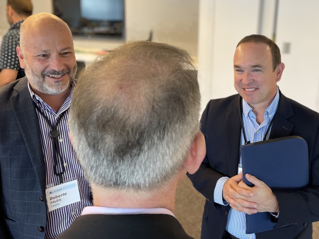 Roberto Mutis of Takeda Pharmaceuticals and Juan Pablo Ruiz Hernandez of LinkAmerica.