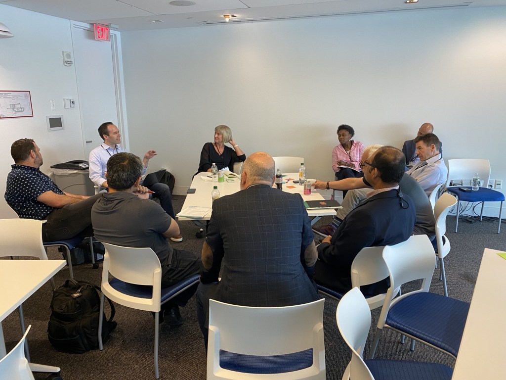 Alex Slawsby of InnoLead makes a point during a breakout session about surviving leadership changes.