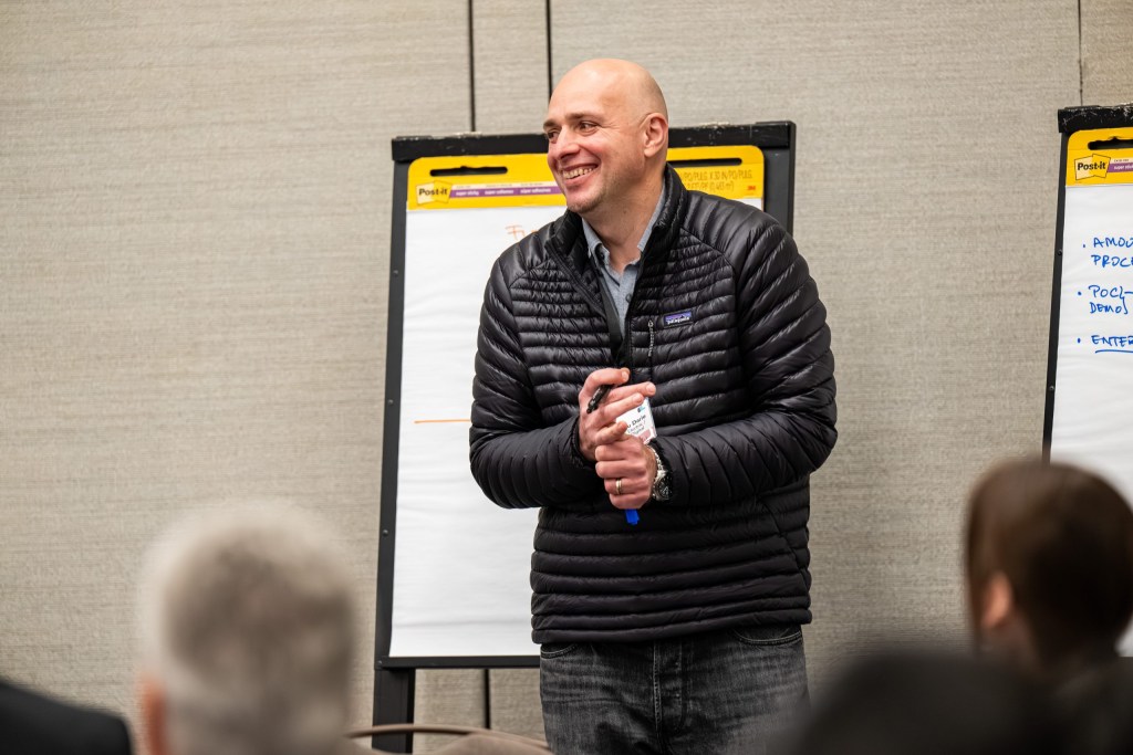 Alexandru Darie of Schneider Electric leads a session on designing and building AI strategies that can scale.