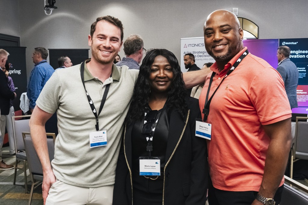 Travis Aion of the Johns Hopkins University Applied Physics Lab with Marie Leese and Shaun Henry of the Dept. of Veterans Affairs.