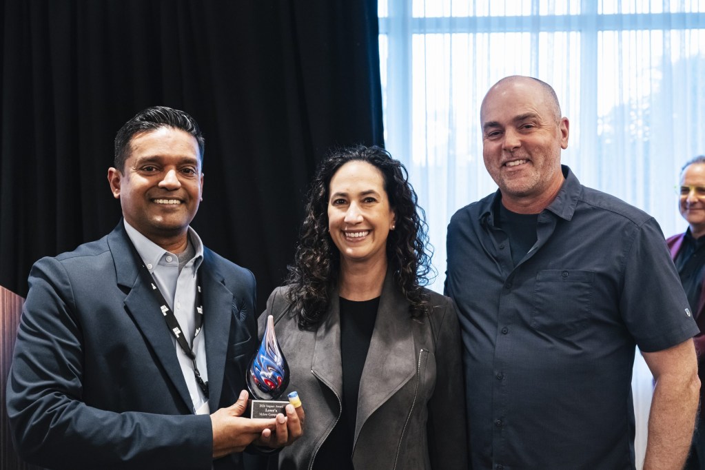 Impact Award winner Deen Abdul-Hathi of Lowe’s with Mara Lewis and Brad Holliday of ID8 Innovation.