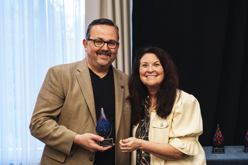 Impact Award winner Peter Roeber of W.L. Gore with Rachel Antalek of Pizza Hut.