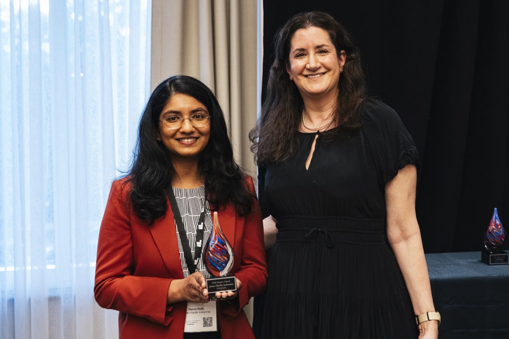 Impact Award winner Durva Naik of James Hardie Industries with Michelle Cohen of CME Group.