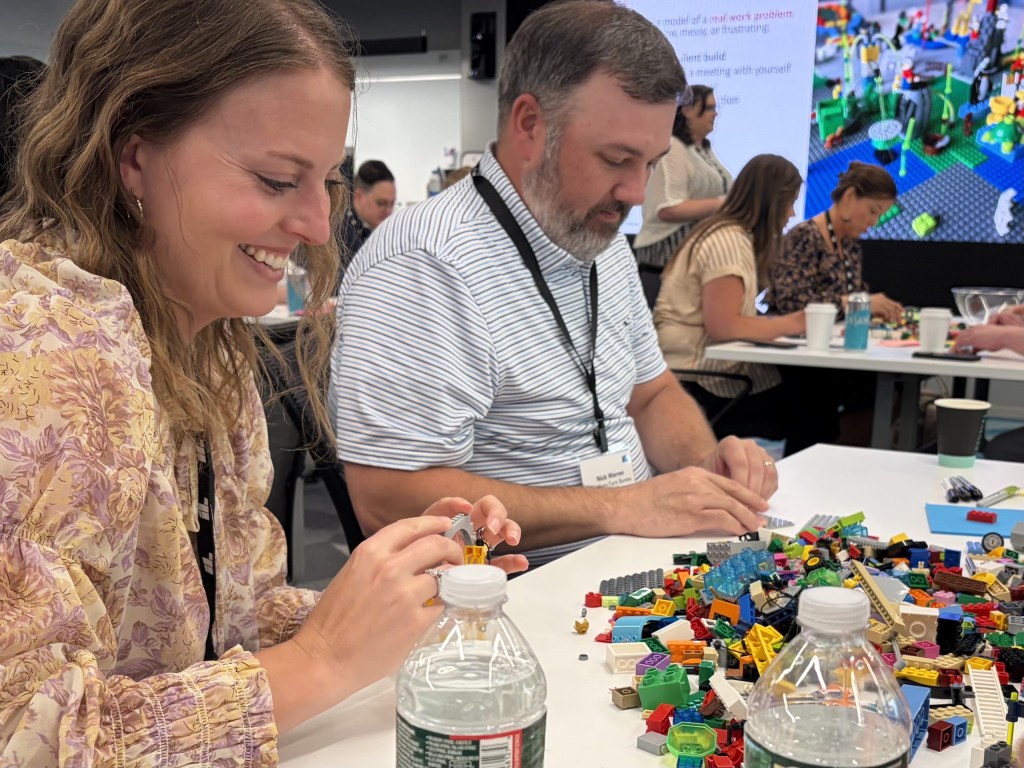 Participants in a workshop called “Bricks, Bots, and Brains.”
