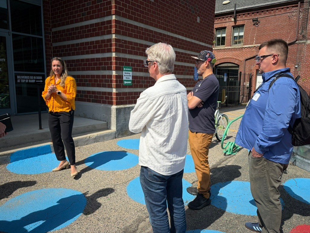 Julia Travaglini, Head of Greentown Labs Boston, hosts a site visit at the energy + climatetech incubator.