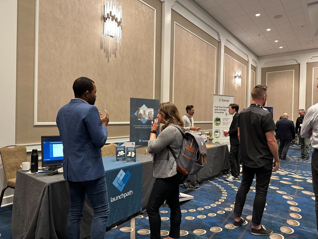 Launchpath, Forest Software, and other providers had demo tables to meet with participants.
