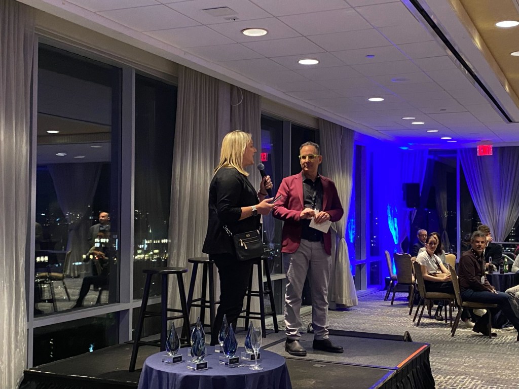 Jodie Brinkerhoff of DFW Airport and Scott Kirsner of InnoLead host the presentation of the 2023 Impact Awards.