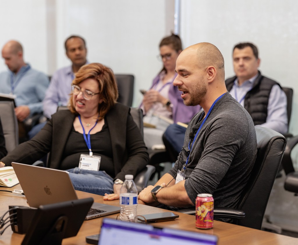 Frankie James of General Motors collaborates with Jan Beránek of U+/FifthRow in a workshop session