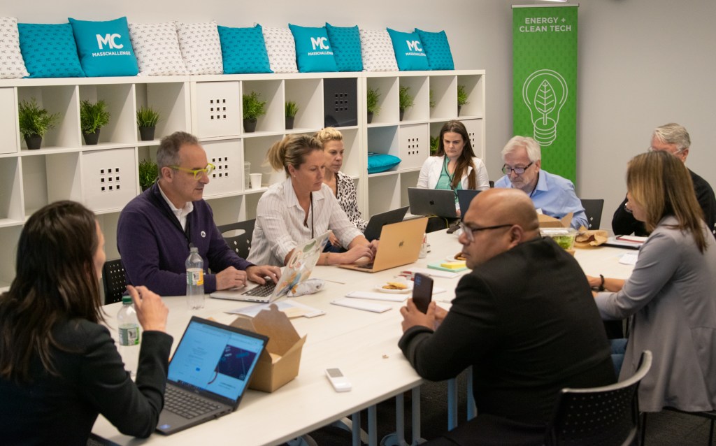 One breakout group explored how AI would change management practices in large organizations.