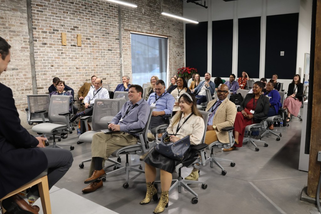 Participants listen to a roundtable discussion on the New Orleans ecosystem.