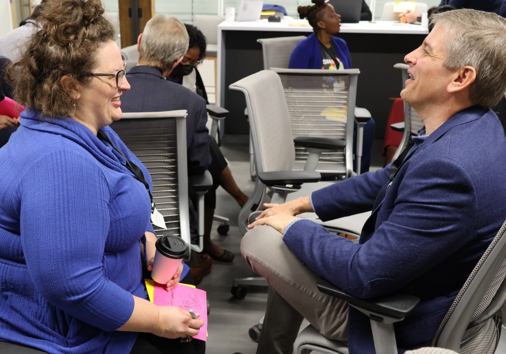 Liz Maxwell of The Idea Village with Jeffrey Philip of Biogen.
