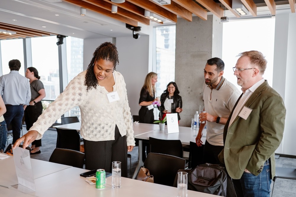 Shannon Humes of Pfizer considers a table topic.