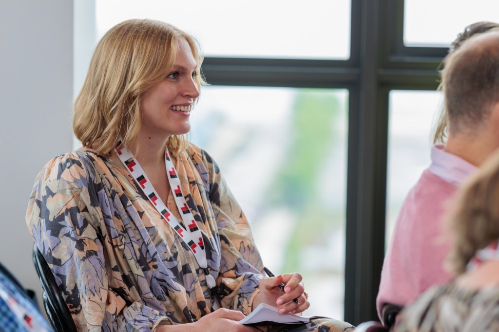 Nicole Corbin-Hanson, Product Manager — Innovation at Moen, interacts with Impact speaker Jess Anselmi (not pictured), who led a breakout session about innovating the customer experience. Anselmi serves as the Vice President of Marketing for The Sill.