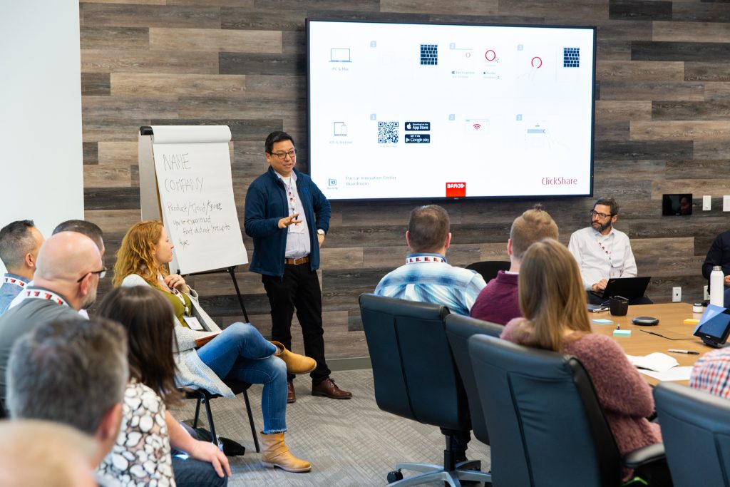 Andy Lee, the Senior Product Manager of Emerging Technology at Starbucks, hosts a breakout session.